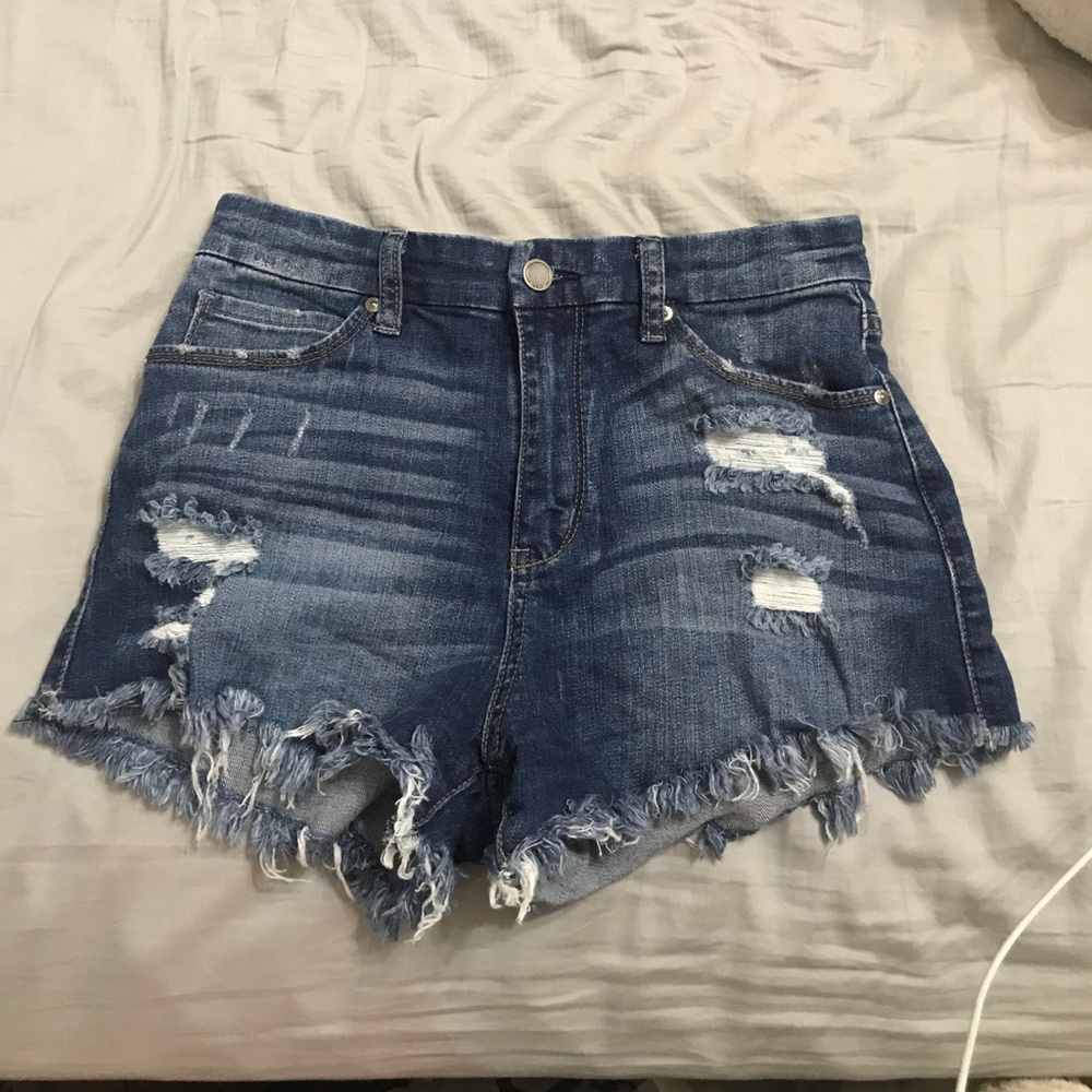Distressed denim shorts
